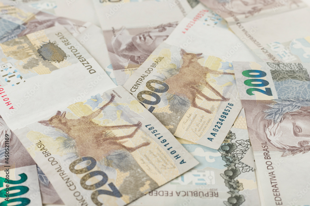 200 reais bills background pattern. Brazilian bank notes