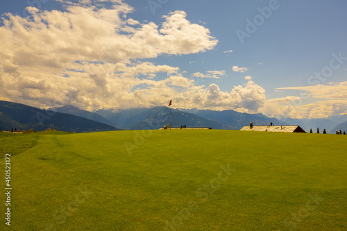 Fotografie, Obraz Crans Sur Sierre Golf Course with Hole 7 and Mountain View in Crans Montana