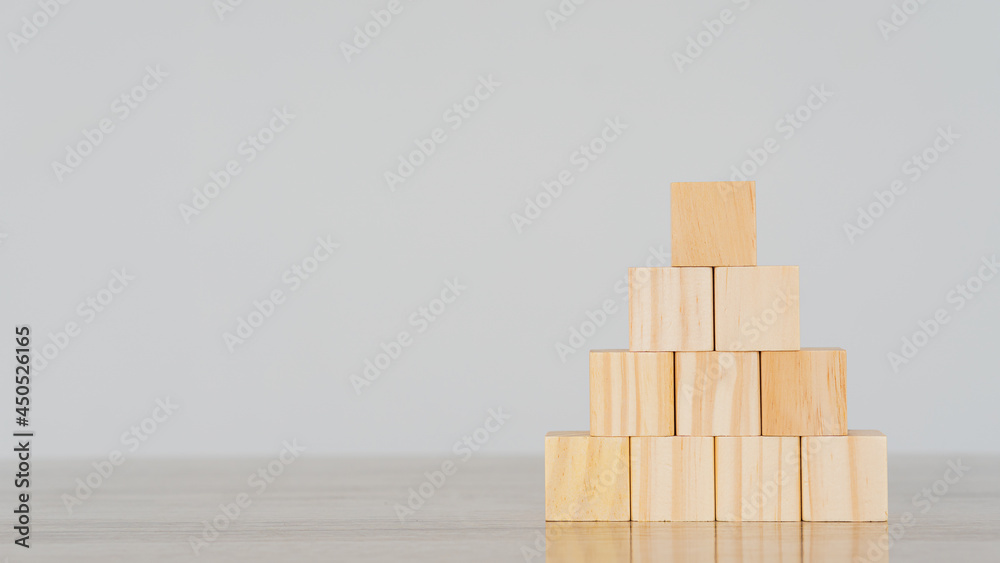 Blank wooden block that looks like a pyramid and can put text on a white background. Blank wooden block that looks like a pyramid and can put text on a white background.