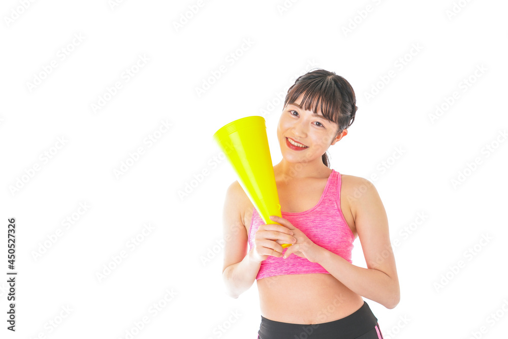 スポーツウェアで応援する若い女性 スポーツウェアで応援する若い女性