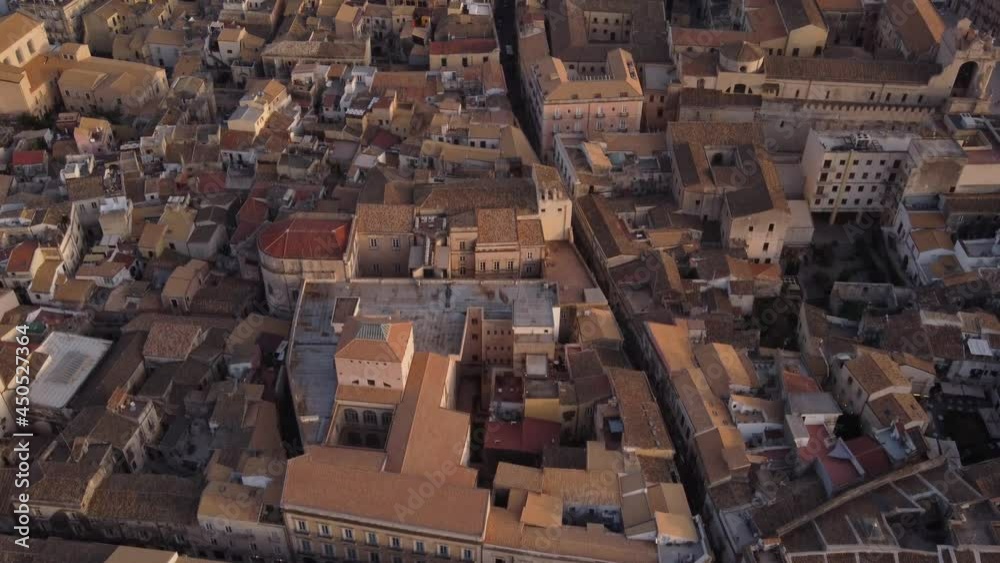 Historical building in downtown of Syracuse, Italy. Aerial drone tilting up view Historical building in downtown of Syracuse, Italy. Aerial drone tilting up view