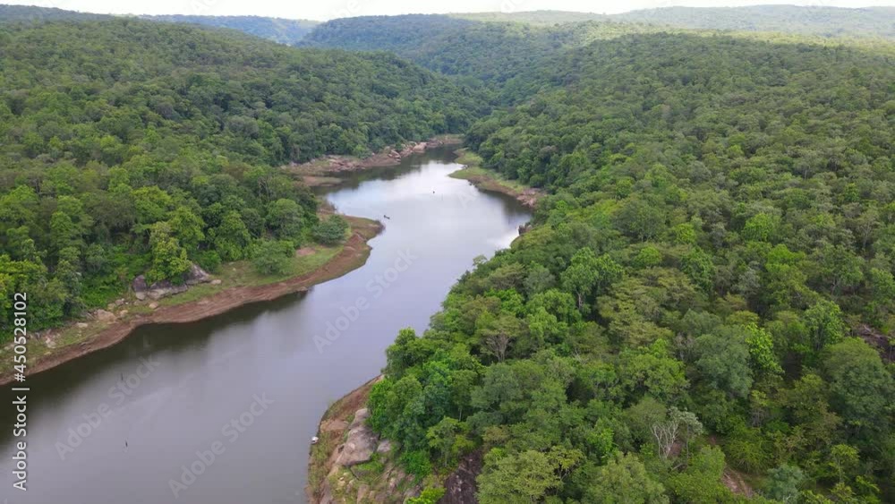 Aerial view flying above the mountain and river in national park Aerial view flying above the mountain and river in national park