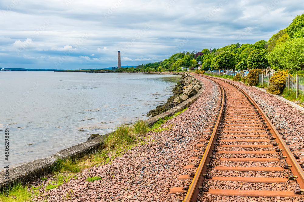 A view along the coastal railway at Culross, Scotland on a summers day
