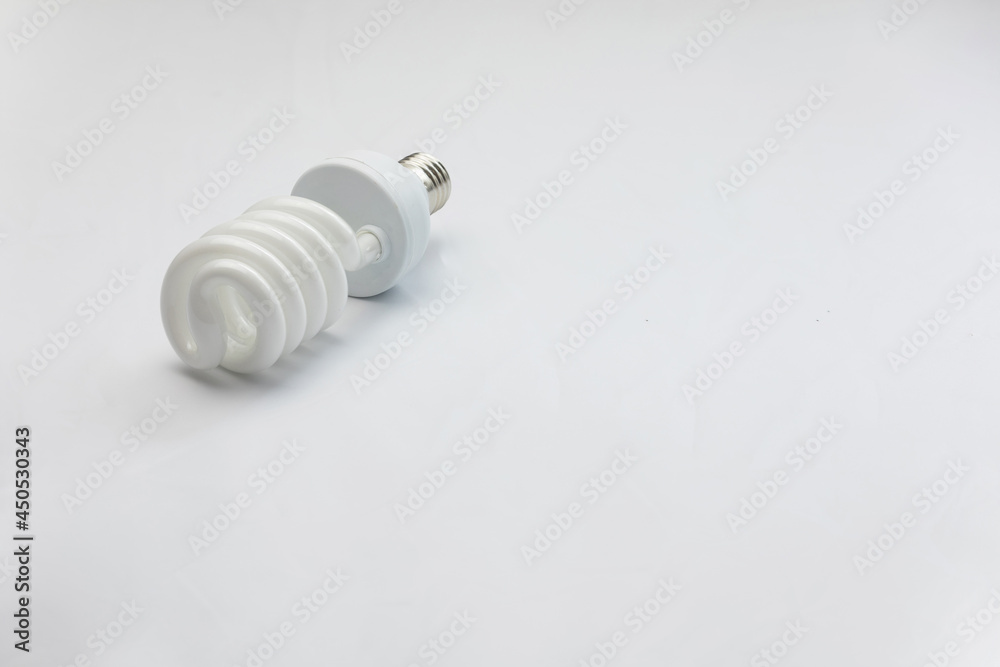 Compact Flourescent Energy Saver Light Bulb on white background Compact Flourescent Energy Saver Light Bulb on white background