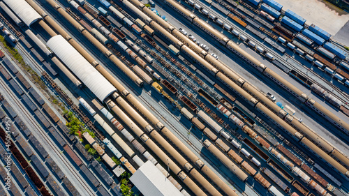 Photography Aerial top view of train container cargo on the railway station for transportation background