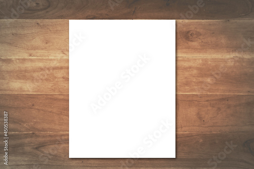 white paper blank frame on old wood background
