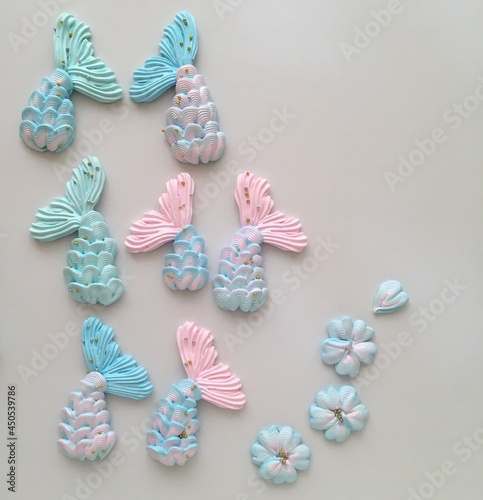 Little cute mermaid tails decorated with sprinkles