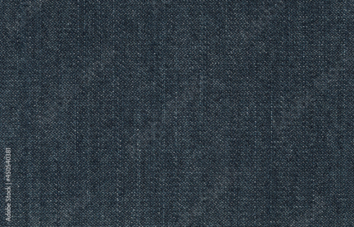 Jeans fabric texture. Dark blue jeans surface. Denim fabric background.