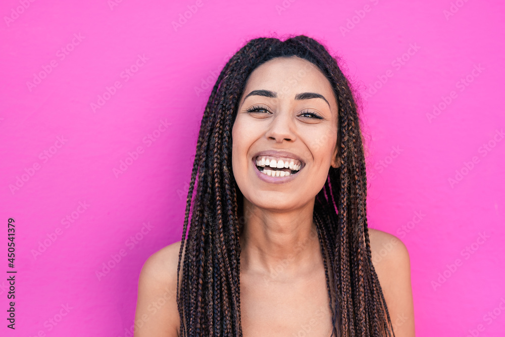 Happy mixed race young woman smiling on camera - Beautiful african girl - concept of happiness Happy mixed race young woman smiling on camera - Beautiful african girl - concept of happiness