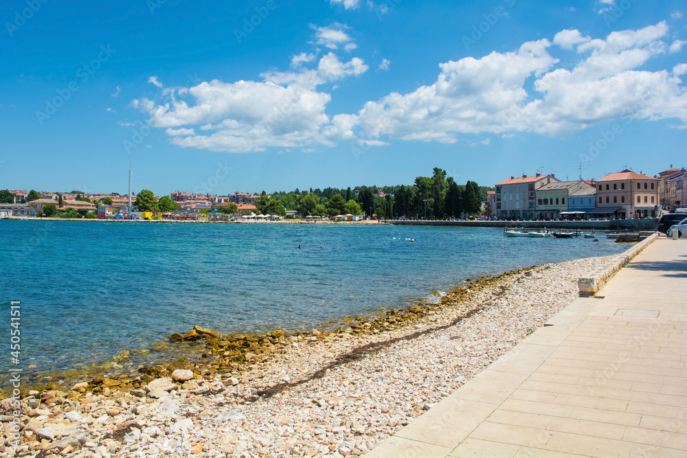 The summer coast just north of the historic centre of Porec on the Istria coast of Croatia The summer coast just north of the historic centre of Porec on the Istria coast of Croatia