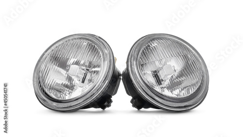 New two fog headlights isolated on white background. Automotive parts.