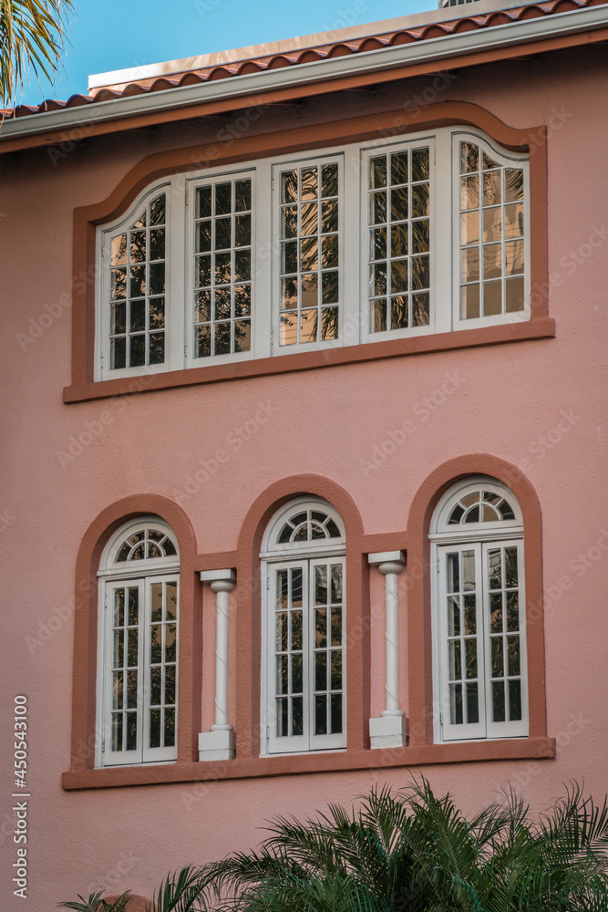 Detail of pink mediterranean style building.