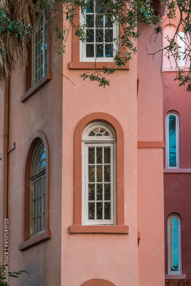 Detail of pink mediterranean style building.