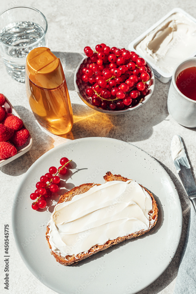 Bread with soft cheese and honey on top. Healthy breakfast concept. Bread with soft cheese and honey on top. Healthy breakfast concept.