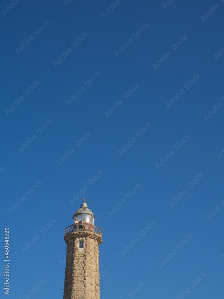 Estepona lighthouse with blue sky and copy space, on the Costa del Sol, Spain