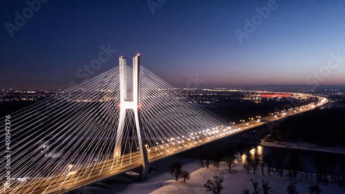 Fototapeta Naklejka Na Ścianę i Meble -  Winter drone photography of Redzinski Bridge over the Odra River in Wroclaw, Poland