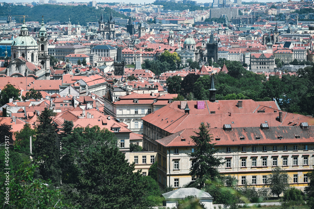 Naklejka premium Prague architecture Red roofs of houses View of red roofs from a height in Prague Prague Castle