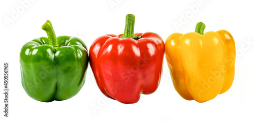 Yellow, green and red pepper isolated on white background