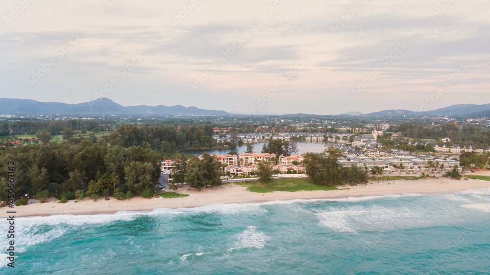 Phuket,Thailand - July 25,2021:Top view or aerial view of Beautiful crystal clear water and white beach.Famous landmark 