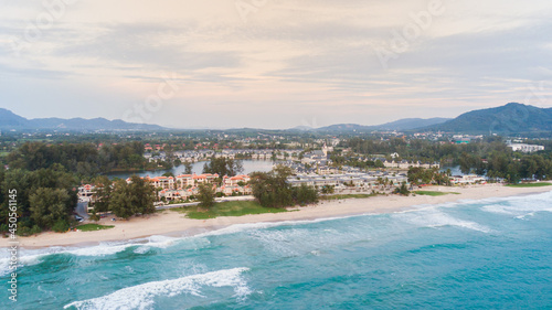 Fototapeta Naklejka Na Ścianę i Meble -  Phuket,Thailand - July 25,2021:Top view or aerial view of Beautiful crystal clear water and white beach.Famous landmark 