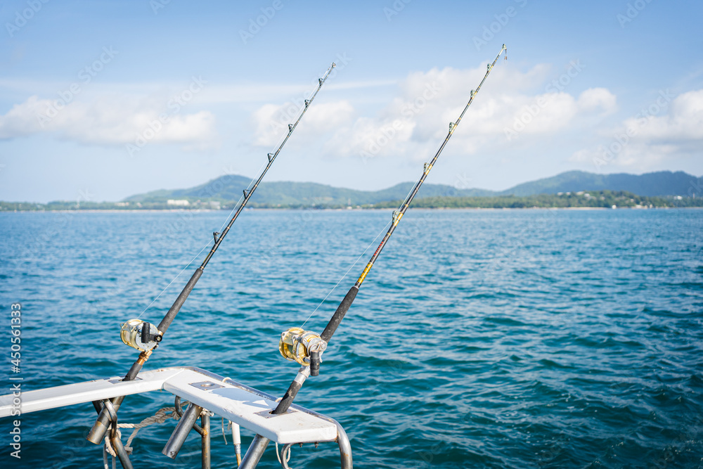Seascape,Fishing reels and rods reels.Outdoor adventure travel to beautiful Hawaii beach