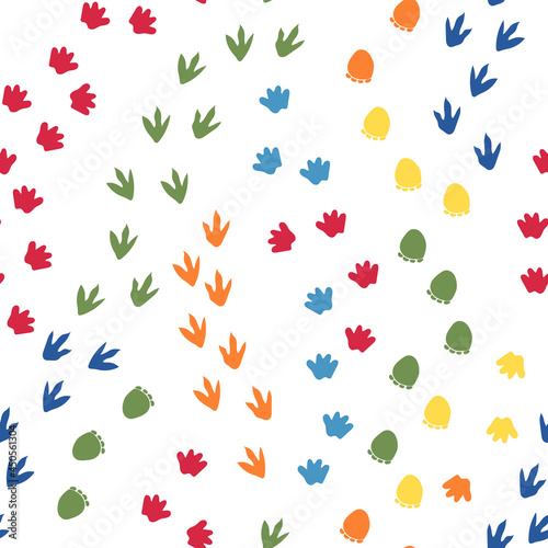 Seamless repeat pattern with different shape colorful dinosaur foot prints tracks on a white background. Great for boys and kids designs