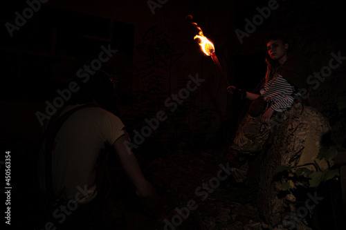 stalker woman with torch and a monster