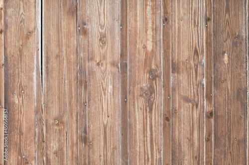 Light brown wooden background with old vertical planks