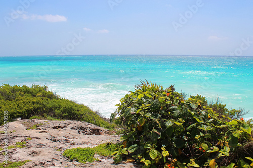 Fototapeta Naklejka Na Ścianę i Meble -  Tropical beach in Tulum, Caribbean sea. Tulum is the site of a pre-Columbian Mayan walled city on Caribbean coastline in Riviera Maya, Quintana Roo, Yucatan, Mexico.