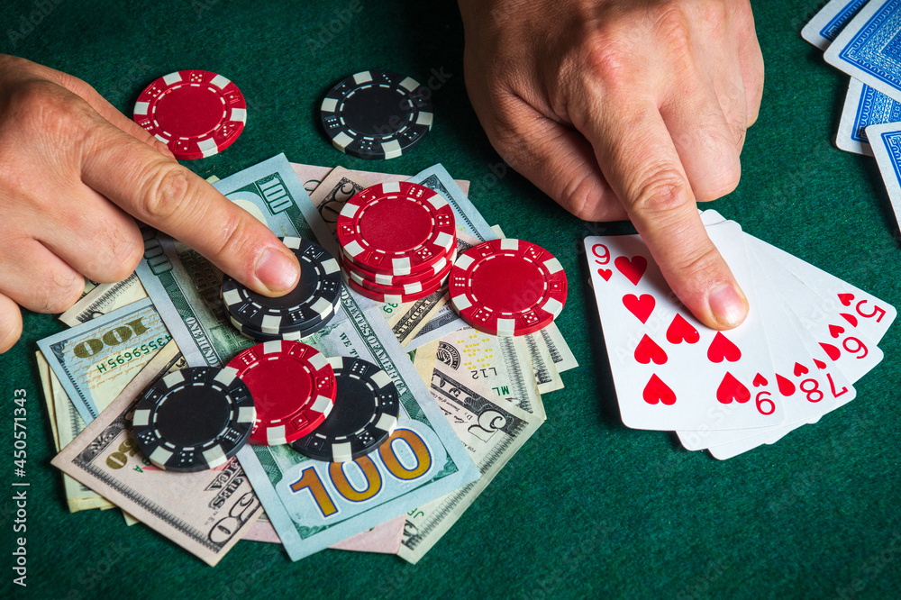 Success in winning on the table in a poker club with a combination of cards straight flush Success in winning on the table in a poker club with a combination of cards straight flush
