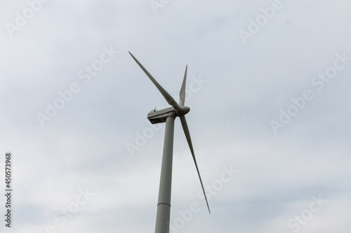 Wind turbine propeller. A wind generator, wind farm or wind turbine is a device for converting the kinetic energy of the wind flow into electrical energy.