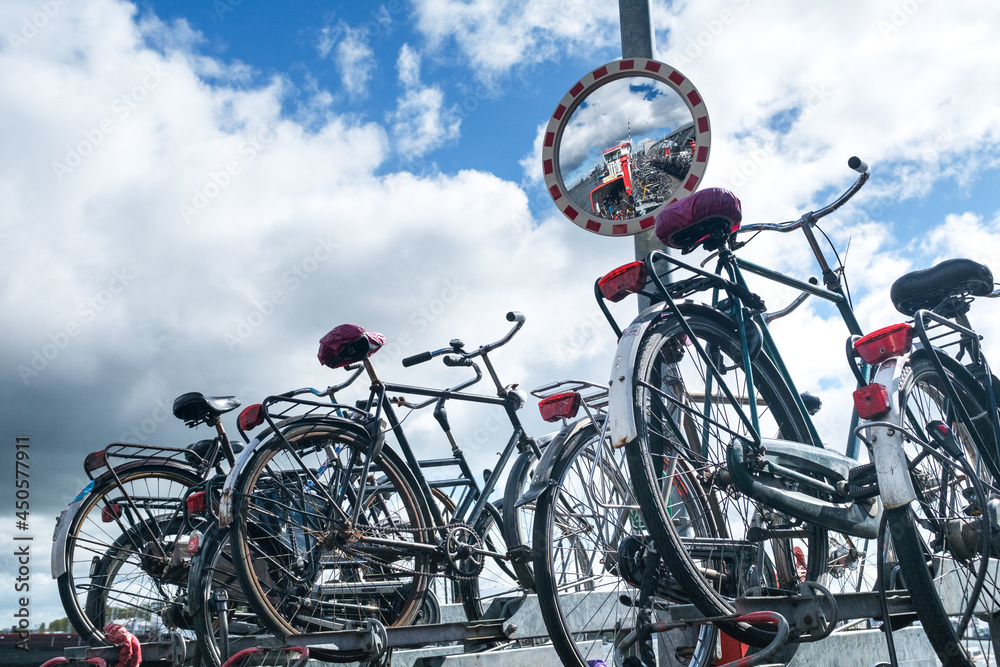 Fototapeta premium Floating bicycle shed behind Central Station in Amsterdam, Noord-Holland province, The Netherlands