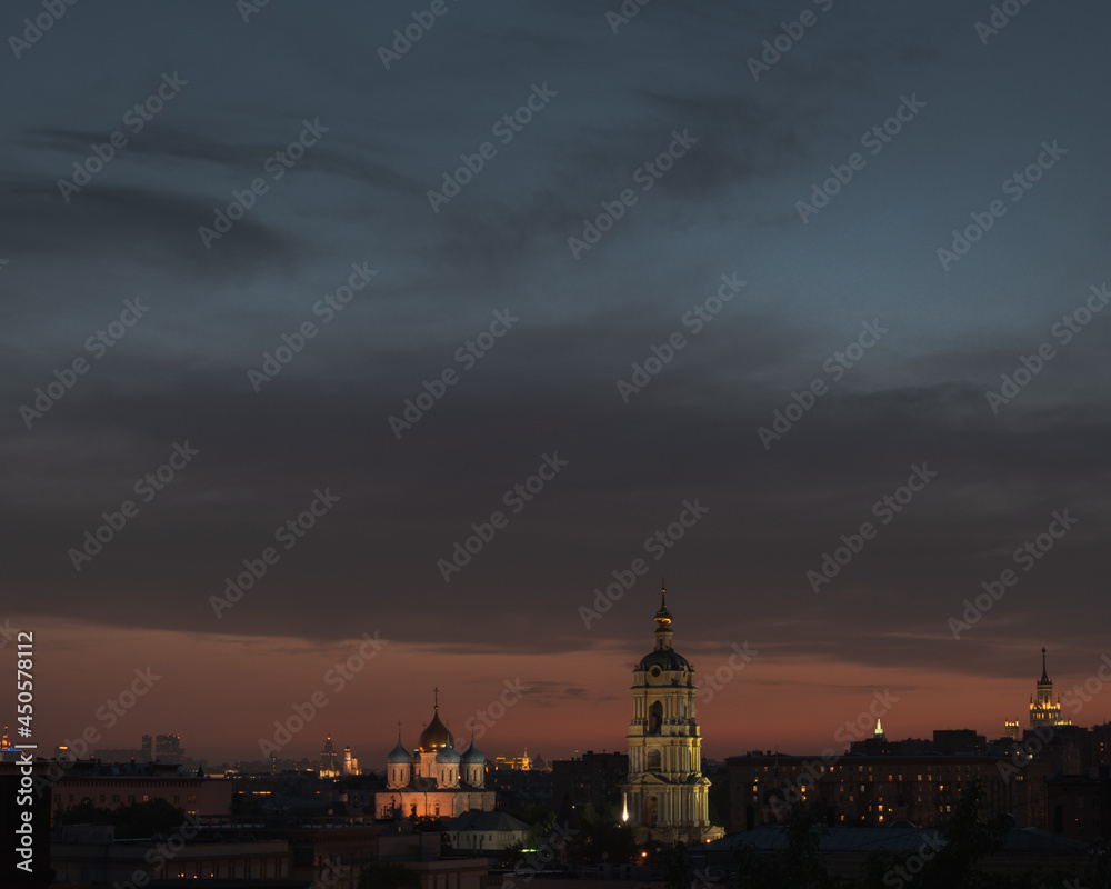 Night cityscape with Novospassky monastery and bell tower