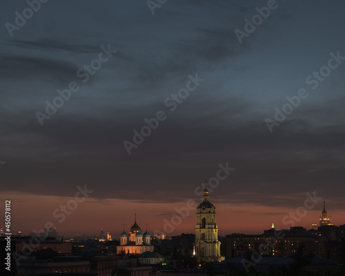Night cityscape with Novospassky monastery and bell tower