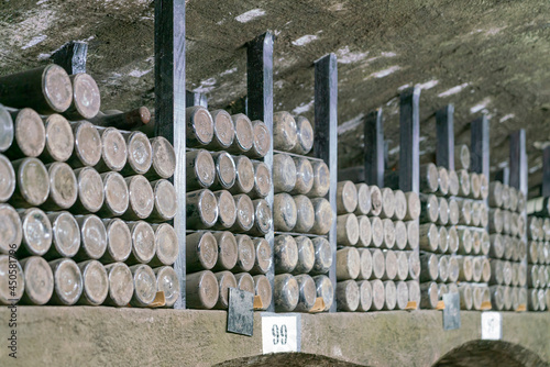 collections of old wine bottles in wine cellars