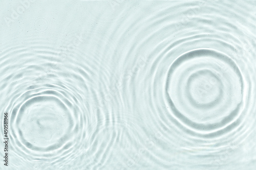 Abstract water texture  surface with drops  rings and ripple.