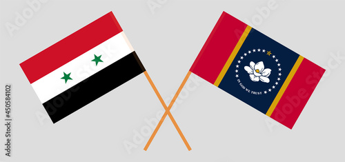 Crossed flags of Syria and the State of Mississippi. Official colors. Correct proportion
