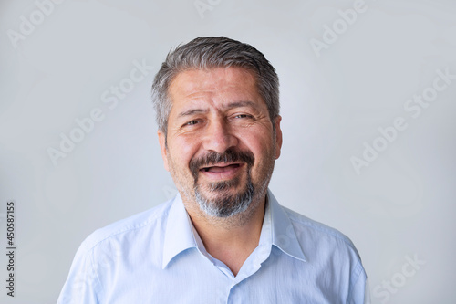 Toothless Man, smiling toothless man on a gray background photo