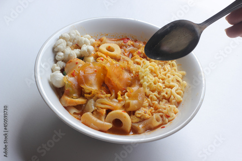 a bowl of seblak, seblak is a food originating in Bandung photo