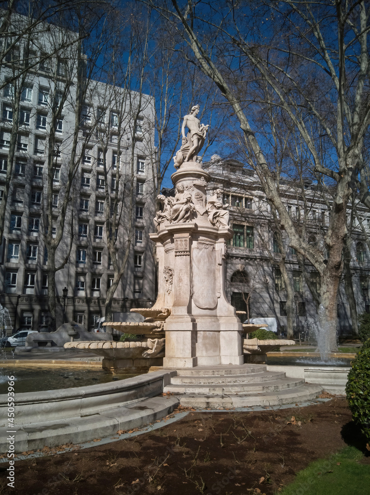 Monumental fountain of Madrid dedicated to the God Apollo and with allegories of the four seasons 