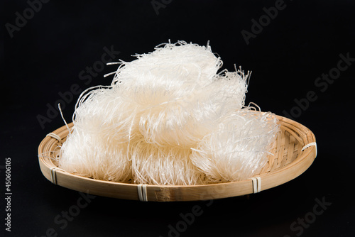 Raw bean vermicelli or dry glass noodles on black background