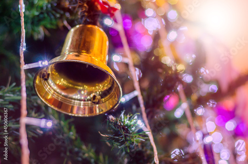 Golden bells christmas hang on trree decorate for celebrate season photo