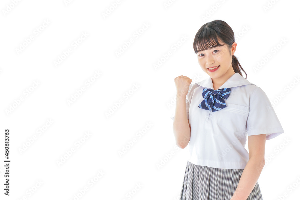 ガッツポーズをする笑顔の女子学生