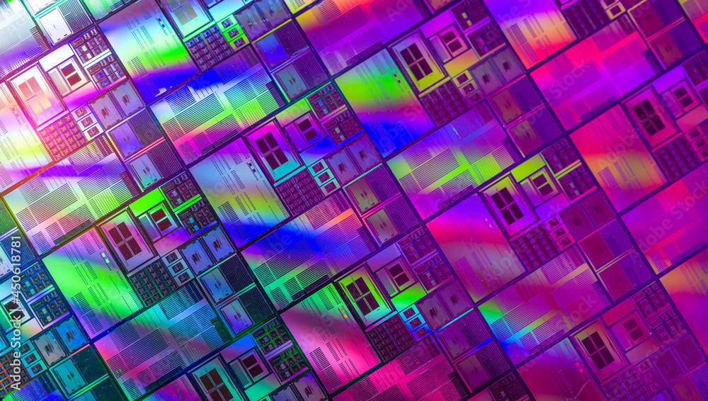 Silicon Wafer with microchips used in electronics for the fabrication of integrated circuits. Silicon Wafer with microchips used in electronics for the fabrication of integrated circuits.