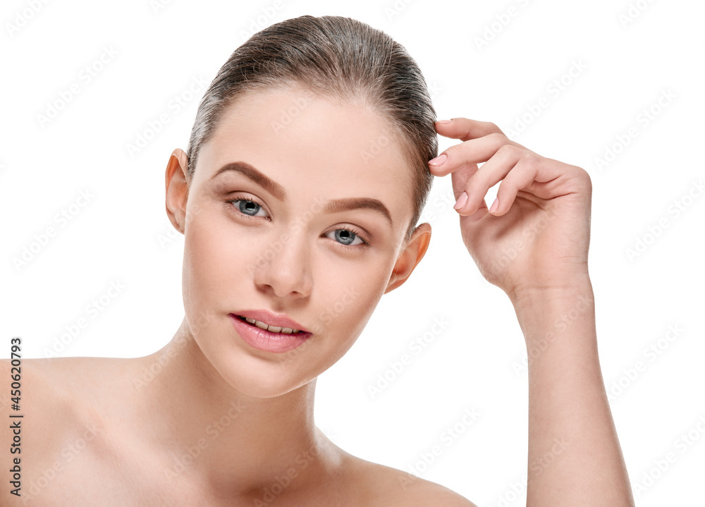 Beauty portrait of young attractive smiling woman with natural makeup on white background, image for skin care products, girl health solutions Beauty portrait of young attractive smiling woman with natural makeup on white background, image for skin care products, girl health solutions
