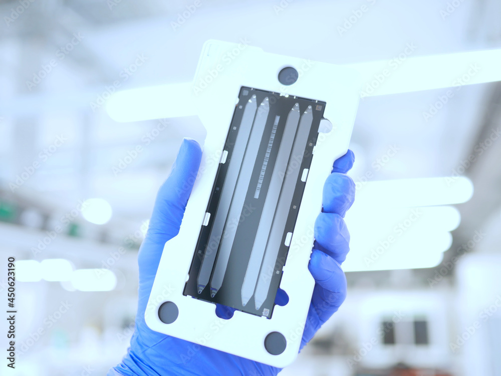 next generation sequencing flow cell of DNA sequencer. genetic engineering, genetic modification, designer baby and cloning concept. cancer screening and medical technology and therapy