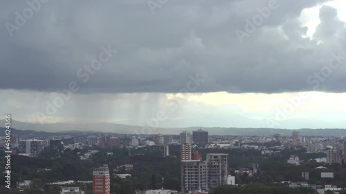 Wallpaper Mural Latin city with heavy clouds. Panning shot of cloudy city Torontodigital.ca