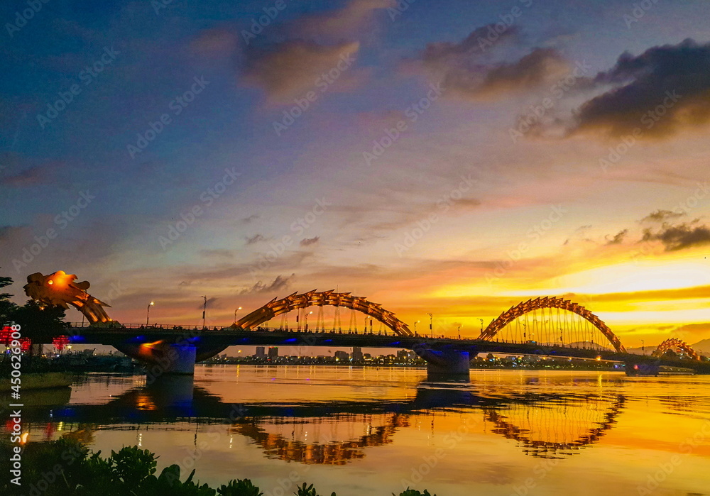 Naklejka premium Photo of sunset sky and big bridge in Vietnam