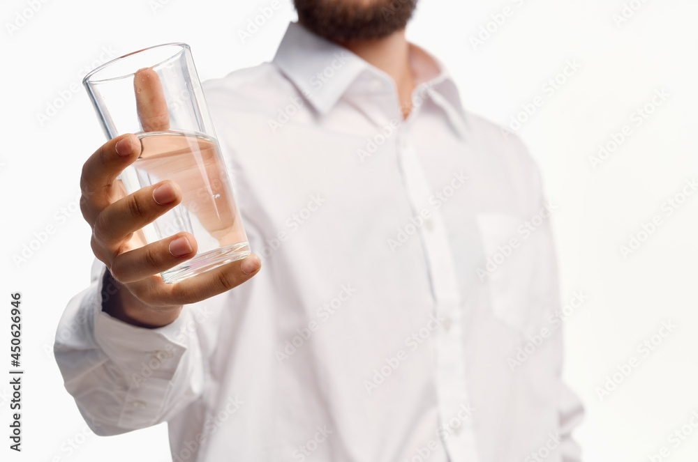 man in white shirt drinking water isolated background man in white shirt drinking water isolated background