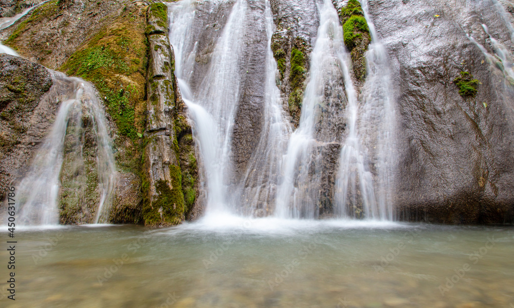 Obraz premium Waterfall on a mountain river.